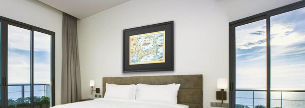 Beach house bedroom with Cape Cod framed map art by Chris Robitaille.