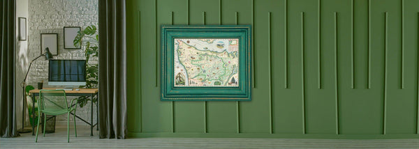 Olympic National Park hand-drawn map in a green frame on a green wall. 