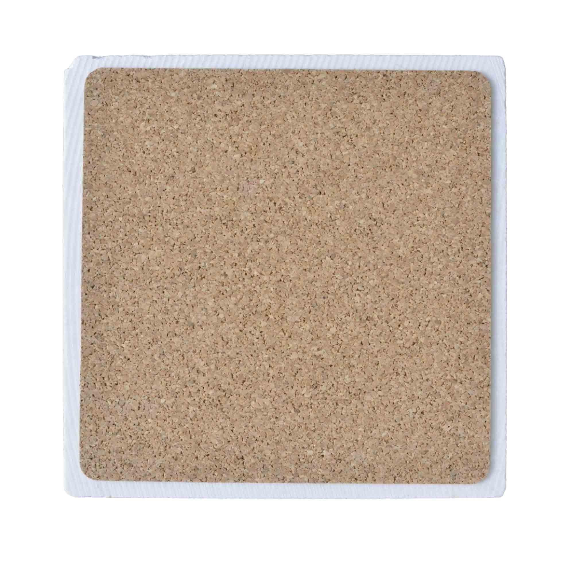 Back view of Xplorer Maps 4x4 natural stone trivet showing cork backing for scratch-free surface protection.