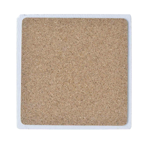 Back view of Xplorer Maps 4x4 natural stone trivet showing cork backing for scratch-free surface protection.
