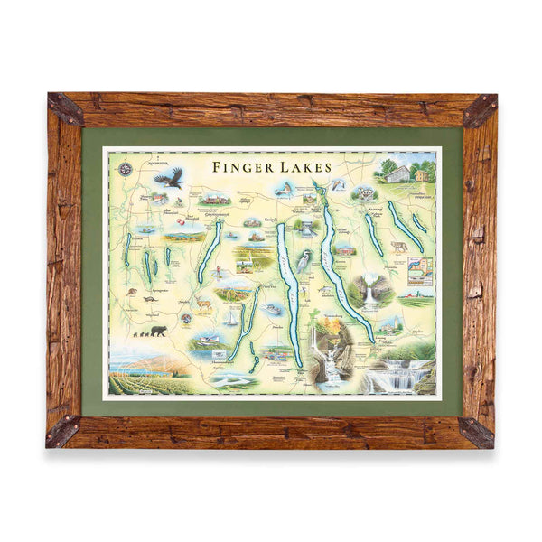 Finger Lakes hand drawn map in greens and blues. The map features Ithaca, Glen Watkins, Syracuse, and Rochester. Waterfalls, bald eagles, Deer and black bear are featured on the map. The map is frames in Montana scraped pine in a green mat.