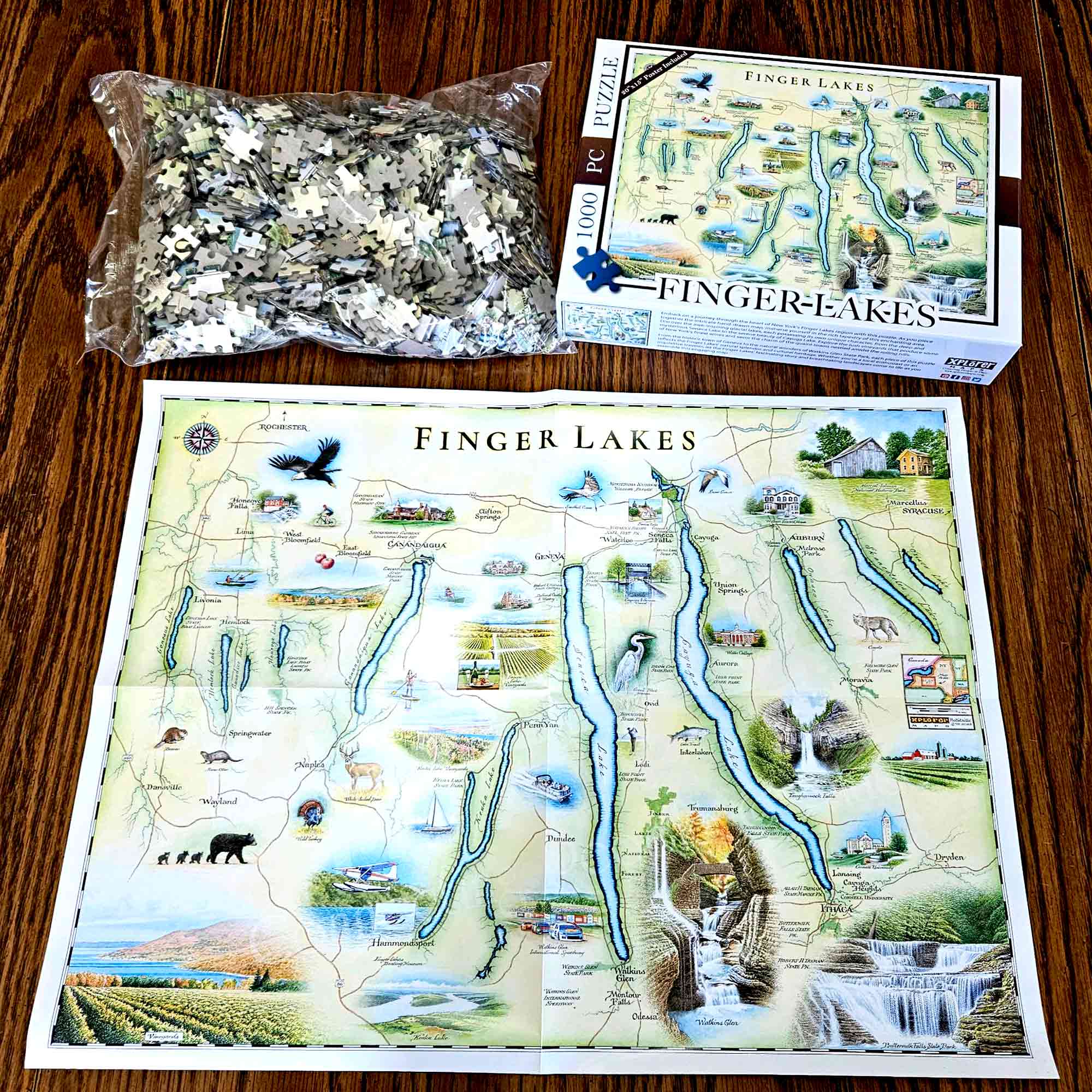 Finger Lakes puzzles taken out of box. Inside the box is a poster for reference.