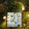 Flathead Ornament hanging on a tree.