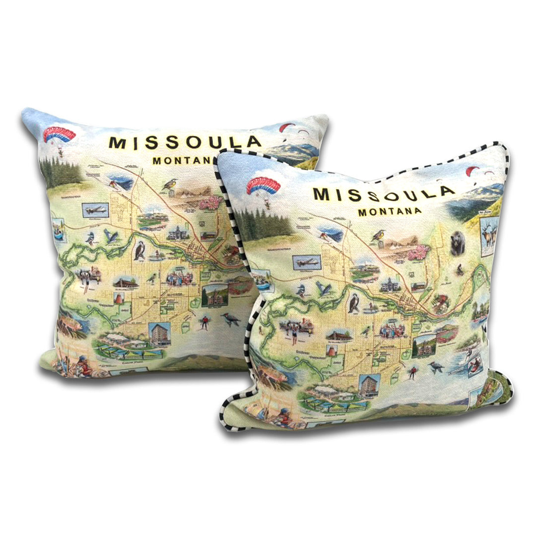 Canvas and velvet Missoula, Montana map throw pillow with black and white piping. Featuring hand-drawn illustrations of local landmarks and wildlife.