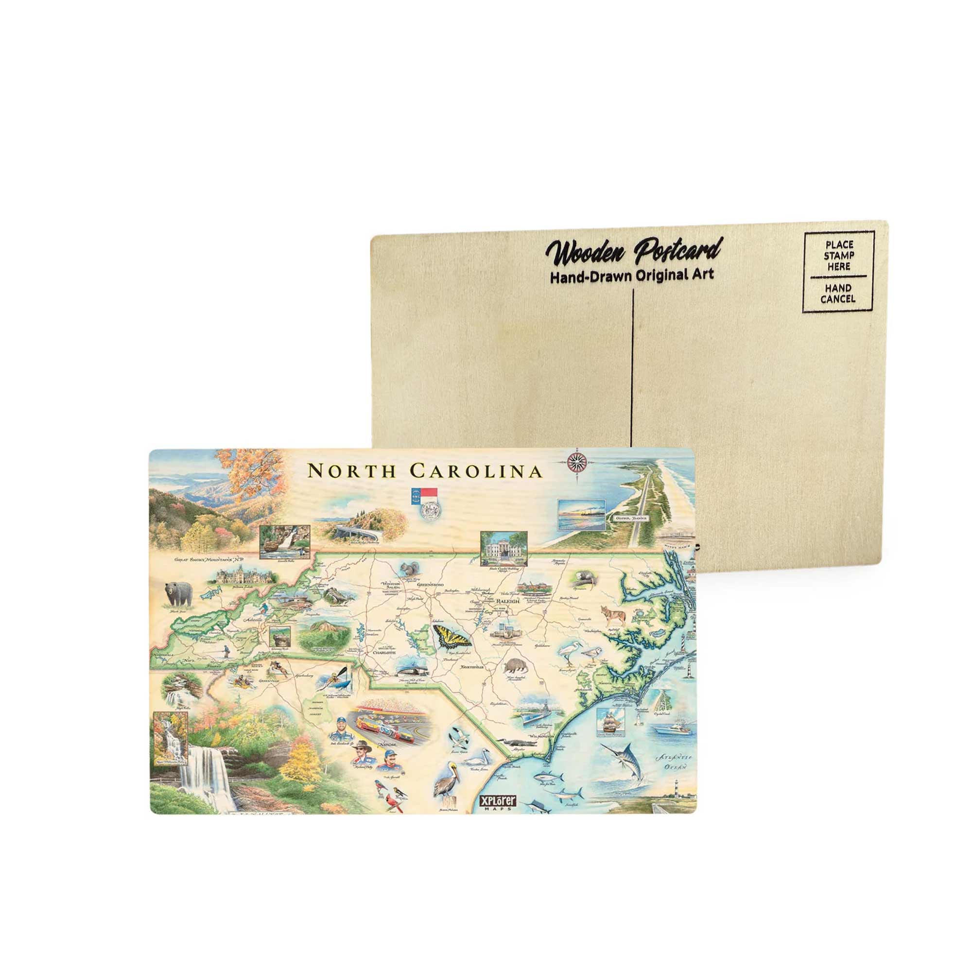North Carolina state map wooden postcard in earth tone blues and greens featuring hand-drawn illustrations of Blue Ridge Mountains, Outer Banks, and native wildlife like the cardinal and dogwood flower.