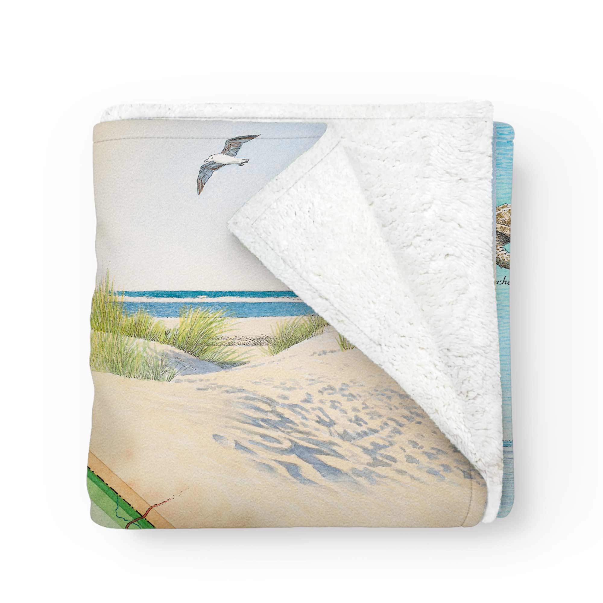 South Carolina Map Fleece Blanket neatly folded with one corner pulled back, revealing the soft fleece lining and detailed map artwork.