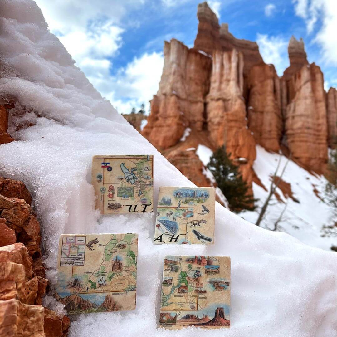 Utah natural stone coaster set sitting in the snow inside Capitol Reef National Park.