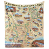 Hanging fleece blanket of Arches & Canyonlands National Park. It features Island in the Sky, Panorama Point Overlook, Angel Arch, Chester Park, Pete’s Mesa, Colorado and Green River, Double Arch, Balanced Rock, Tower Arch, Double O Arch, and Delicate Arch. Wildlife and plants include rattlesnakes, bobcats, Desert Bighorn sheep, falcons, golden eagles, red foxes, porcupines, mule deer, mountain lions, coyotes, and lizards. Indian Paintbrush, Claret Cup Cacti, and Columbines.