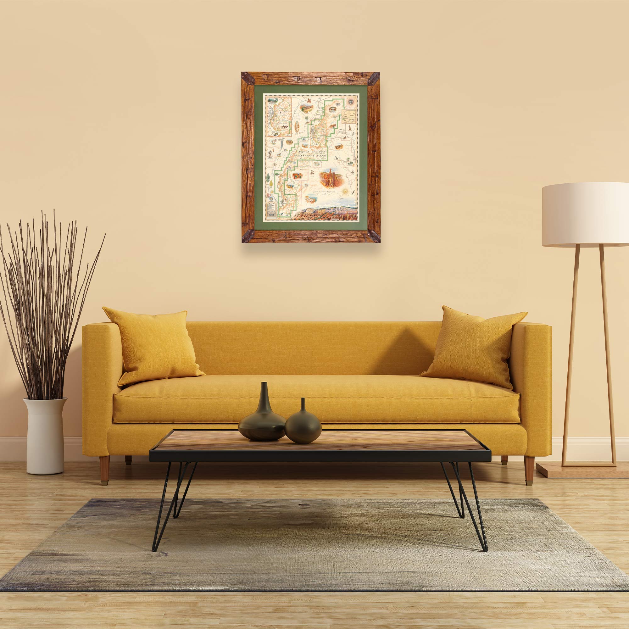 Bryce Canyon National Park Hand-Drawn Map haning on a tan wall over a yellow couch. The map is framed in Montana hand scraped pine with green mat.