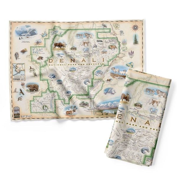 Denali National Park map kitchen dishwashing towel in earth tones of beige and green. Featuring illustrations of the major flora and fauna found in the park, such as grizzly bears, wolverines, moose, lynx, Dall sheep, and many more. Major attractions are illustrated on the map, like the Talkeetna Visitor Center, Denali Visitor Center, Ruth Glacier, and Kahiltna Glacier.