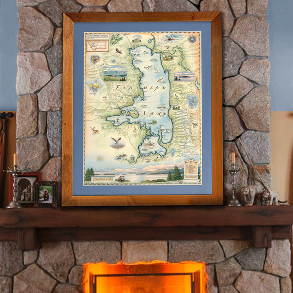Flathead Lake hand-drawn story-map in a montana larch. The picture is sitting on a mantel ledge on a fireplace.