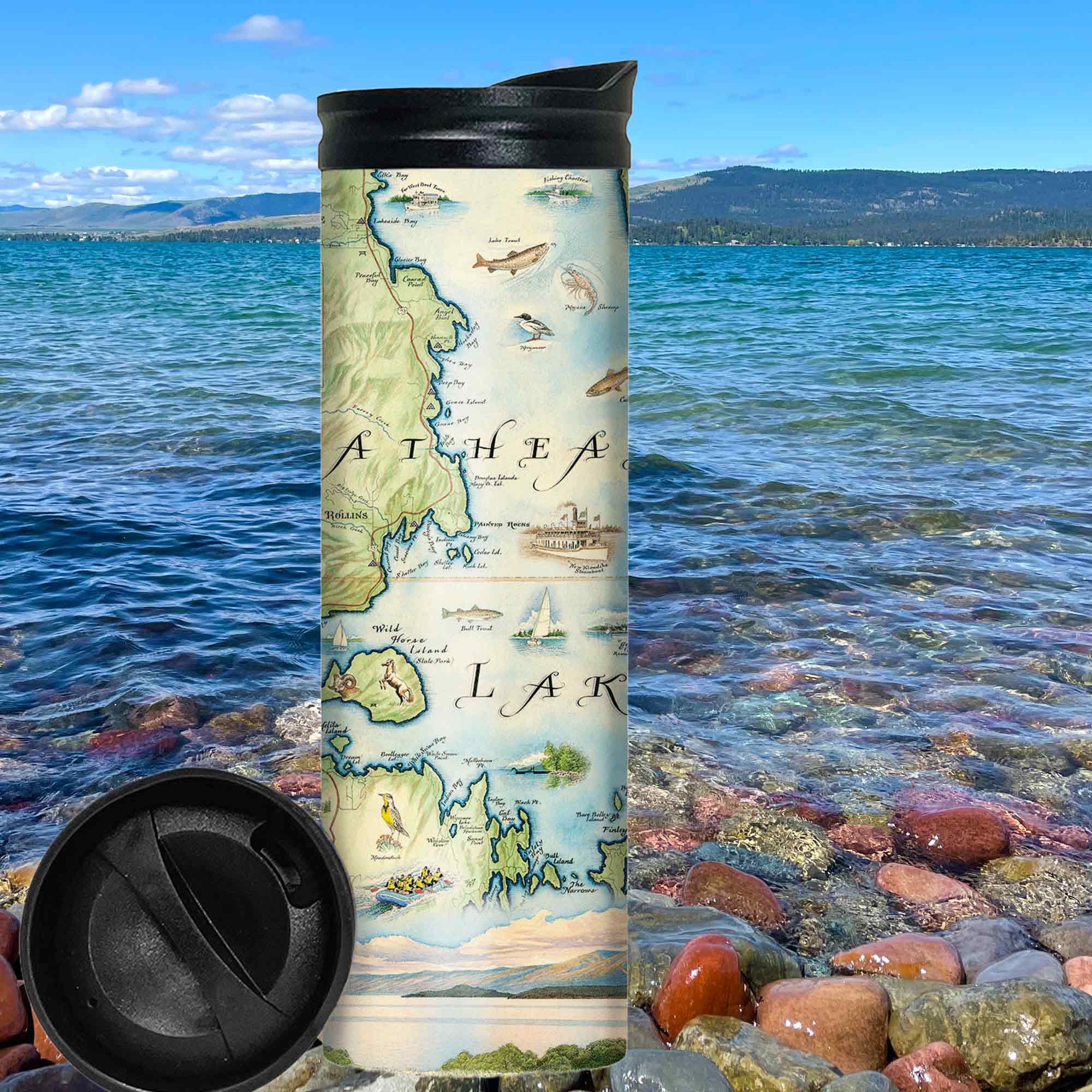Montana's Flathead Lake with rocks and mountain in the background.