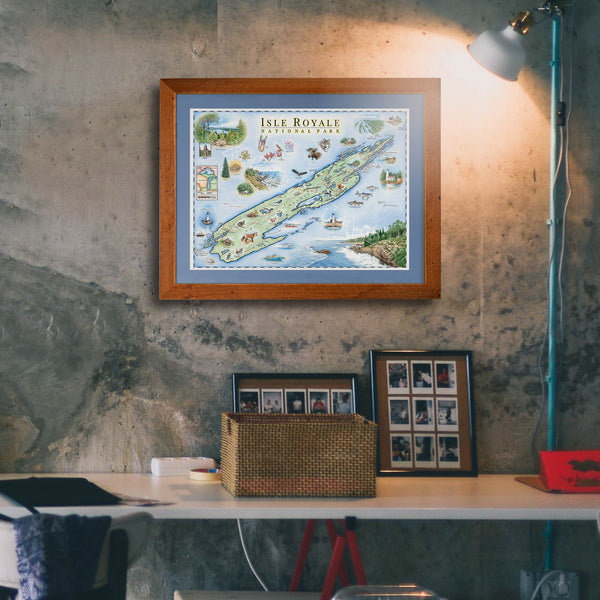 Isle Royale National Park hand-drawn map hanging on a gray marble like wall in a reclaimed Montana Flathead Lake frame with blue mat in an office.