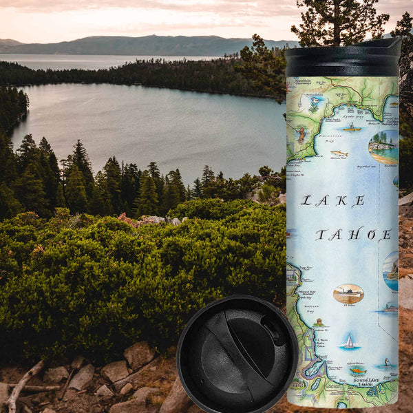 Lake Tahoe Travel coffee mug sitting on a mountain cliff over looking Lake Take. The map features the land's topography along with the area's flora and fauna, such as Emerald Bay, Cove Rock, Thunderbird Lodge, and Cal Neva Lodge & Resort.