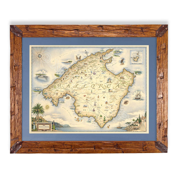 Mallorca Island hand-drawn map in earth tones blues and greens. The map print is framed in Montana hand-scraped pine with a blue mat.