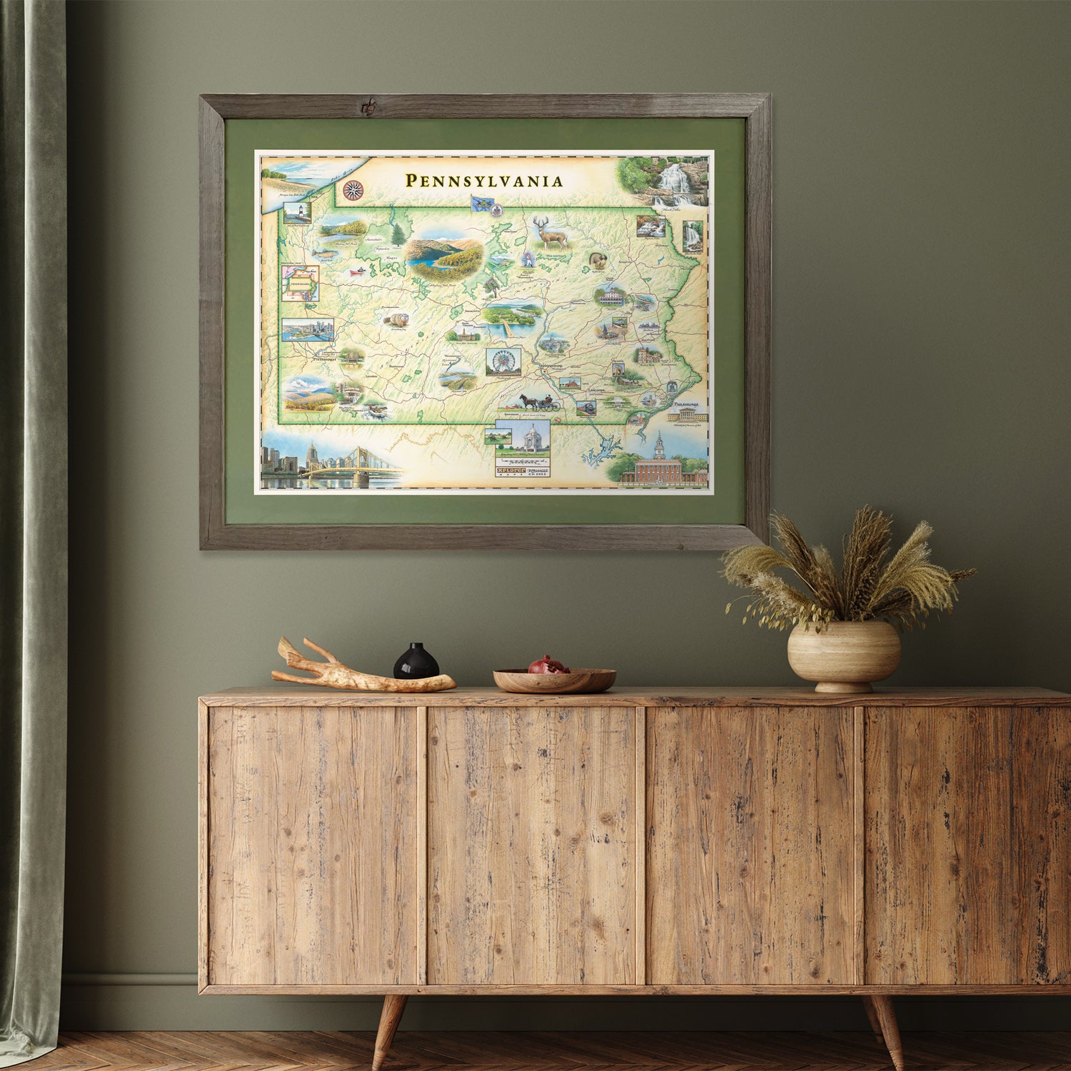 Xplorer Maps state map of Pennsylvania hangs on a green wall in a hallway above a table. 