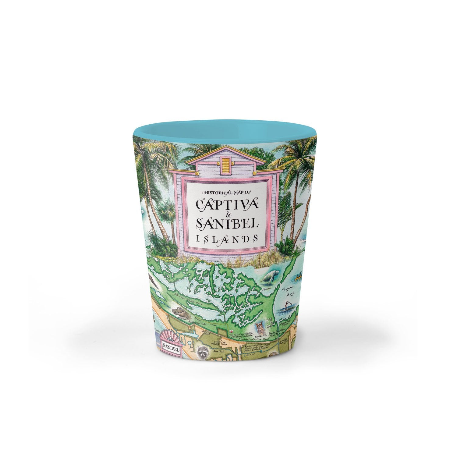 Florida's Sanibel & Captiva Islands Map Ceramic shot glass by Xplorer Maps. The map features illustrations of places such as Ding Darling Wildlife Sanctuary, Bailey-Matthews Shell Museum, and Sanibel Lighthouse. Flora and fauna include the Loggerhead sea turtle, Manatee, and Great Blue Heron. Many other birds and sea animals are illustrated.