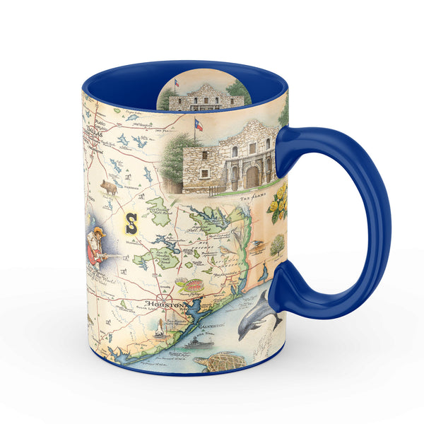 Blue 16 oz Texas State Map Ceramic Mug. The map features illustrations of places such as the Alamo, San Antonio Riverwalk, and Guadalupe National Park. Flora and fauna include Venus flytraps, longhorns, Monarch butterflies, and armadillos.