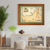 The United Arab Emirates framed hanging on a wall in the living room. There is a plant next to the map print.
