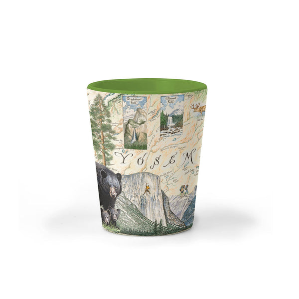 Yosemite National Park Map Ceramic shot glass by Xplorer Maps. The map features illustrations of places such as Vernall Falls, El Capitan, and Half Dome. Flora and fauna include mule deer, Indian paintbrush, grey owl, coyote, and a black bear with her cubs. Other illustrations include John Muir, mountain climbing, hiking, and Ansel Adams. 