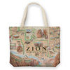 Zion National Park Map Canvas Tote Bags by Xplorer Maps. The map features illustrations of Angels Landing, Weeping Rock, The Narrows, and Kolob Canyon. Flora and fauna include Mojave desert tortoise, western columbine, and desert marigold.
