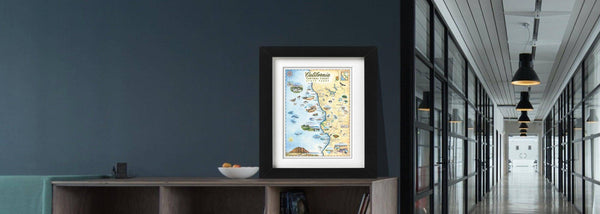 California Central Coast State Parks framed map leaning against a navy blue wall in a hallway. art by Chris Robitaille.