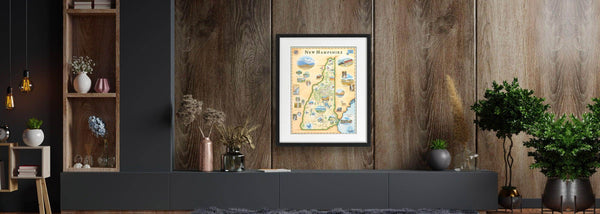 Natural cozy Interior living room  displaying the New Hampshire framed map art by Chris Robitaille.