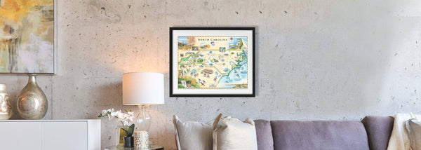 Interior home with a velvet couch displaying the North Carolina framed map art by Chris Robitaille.