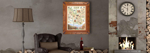 Zion National Park hand-drawn map hung on a brick wall in an home over a chair and wood pile.. 