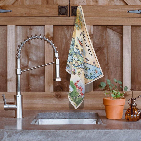 kitchen towel with Xplorer Maps 1000 Islands hand-drawn story map art hanging in a kitchen by the sink. Rustic wood or polished granite, this towel looks great in any kitchen.