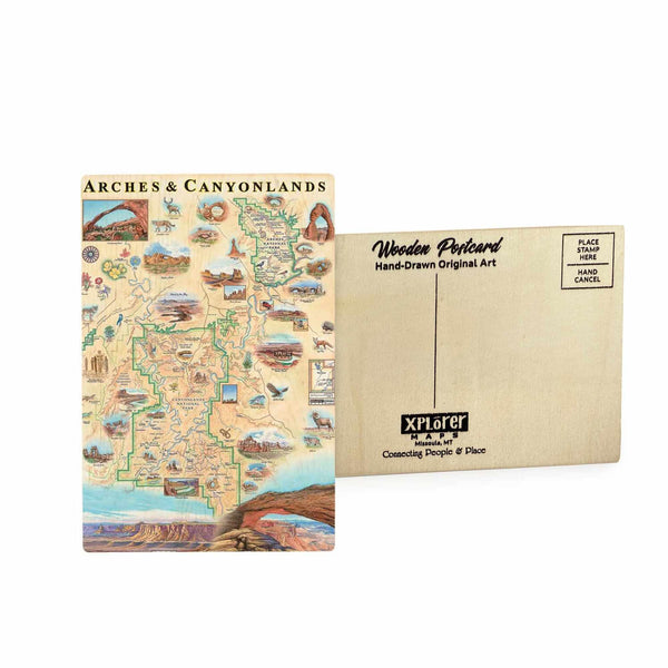 Arches & Canyonlands National Parks wooden postcard in earth tone colors featuring Double O Arch, desert flowers, bighorn sheep, fox, and eagles.
