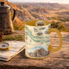 Badlands Mug with map design on a wooden surface with scenic background