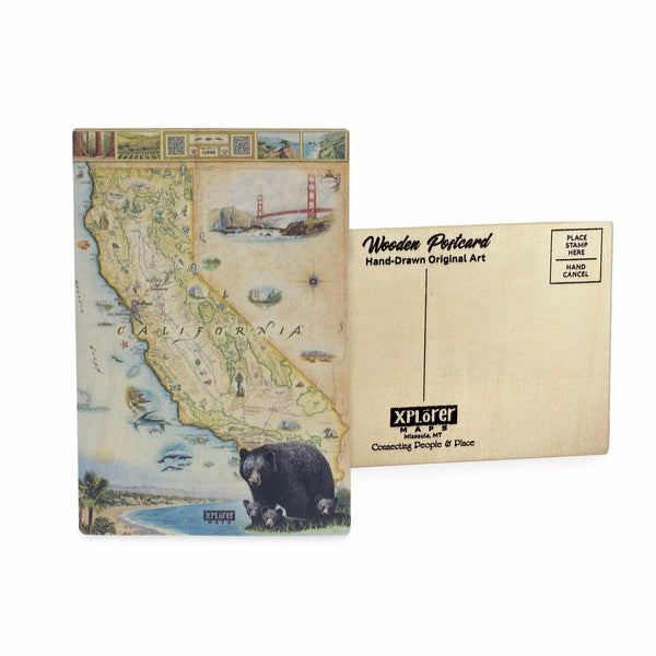 California State Map wooden postcard in earth tone colors featuring hand-drawn illustrations of landmarks, cities, and a black bear with cubs.