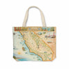 California State Map Canvas Tote Bag in earth tone colors. Featuring San Francisco, Sacramento, Los Angeles, Golden Gate Bridge, Pacific Ocean, Redwoods, and Yosemite National Park. Flora and Fauna illustrations include flowers, artichokes, grapes, a black bear, whales, fish, an octopus, and a turtle.