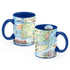 Cape May Map coffee mug front and back view in earth tones of blue and green. The map features heron and whale species. Map features Cape May, Lower Township, and West Cape May. Cape May Harbor, Congress Hall, Washington St. Mall, and Cape May Bird Observatory. 