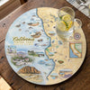 Serving Tray Map of California Central Coast State Parks on a placemat with a glass of water and lemon slices.
