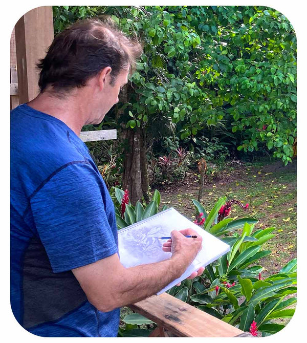 A Man drawing in costa rica. 