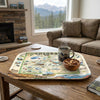 Tray with a Colorado map design on a wooden table in a cozy living room.