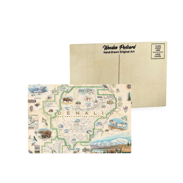 Denali National Park Map wooden postcard in earth tone colors featuring hand-drawn illustrations of Mount Denali, Alaskan wildlife, and rugged landscapes.
