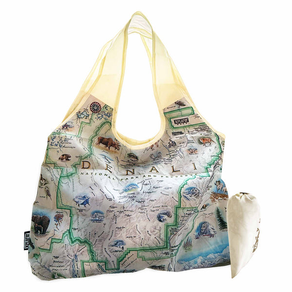 Denali National Park Map Pouch Tote Bags by Xplorer Maps. Featuring illustrations of the major flora and fauna found in the park, such as grizzly bears, wolverines, moose, lynx, Dall sheep, and many more. Major attractions are illustrated on the map, like the Talkeetna Visitor Center, Denali Visitor Center, Ruth Glacier, and Kahiltna Glacier.