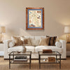 Utah's Capitol Reef National Park in a Montana hand-scraped pine wood frame with a blue mat hanging above a white couch.