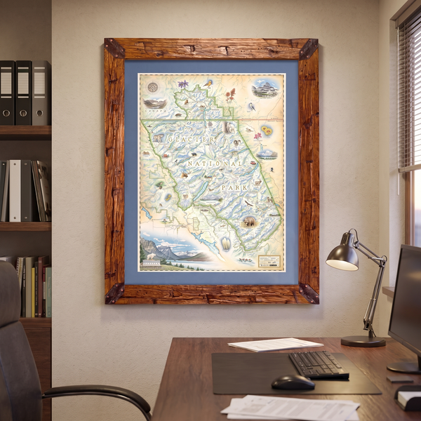 Montana's Glacier National Park hand-drawn map framed above a desk. 