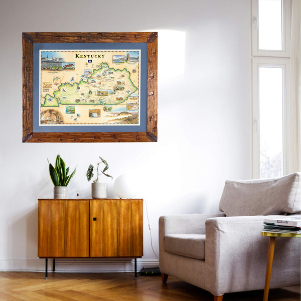 Framed map of Kentucky on a wall above a wooden cabinet and gray sofa.