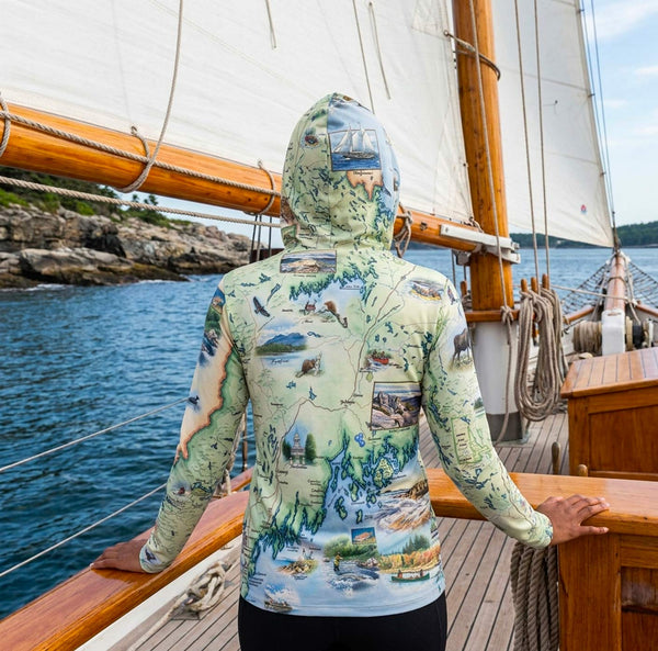 Back of hoodie with a 'Maine' map design on a boat and ocean background