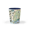 Toast to Maine's allure with our captivating shot glass. Featuring iconic landmarks and coastal scenes sea life, and animals, it's a perfect memento of the Pine Tree State's beauty. 1.5 oz - blue.