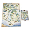A completed jigsaw puzzle of Michigan showing a detailed illustrated map with state landmarks and animals, displayed next to its retail box on a white background.