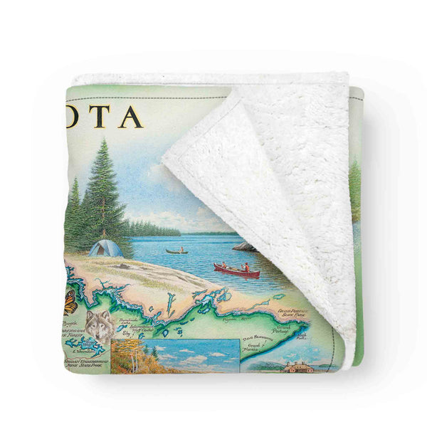 Blanket with a scenic map design of Minnesota on a white background