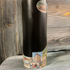 Missoula Map Wrap on a Black Stainless Steel Water Bottle close up. The background is light wood. 