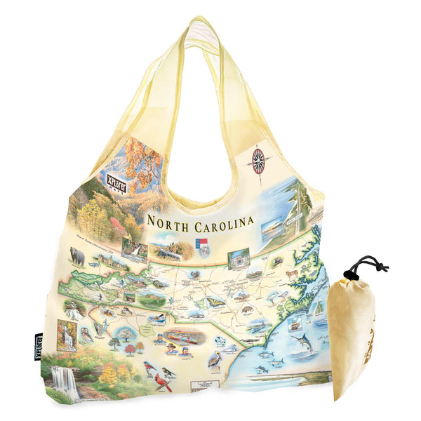 North Carolina State Map Pouch Tote Bags by Xplorer Maps. The map features Dry Falls in the Nantahala National Forest, the Outer Banks, a Nascar Hall of Fame, and the USS North Carolina on the coast.