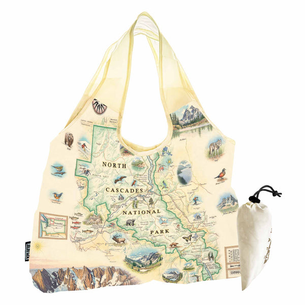 North Cascades National Park Pouch Tote Bags -  Xplorer Maps. The map features illustrations of flora and fauna such as black bears, elk, wolverine, glacier lilies, and huckleberries. Other illustrations include Pickett Range, Cascade Pass, and Lake Chelan Recreation area.